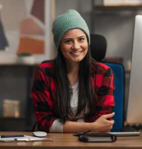 happy-female-video-editor-works-indoors-in-creativ-YU3YPTH.jpg
