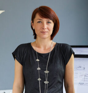 portrait-of-two-confident-female-designers-at-offi-L55KUTY.jpg